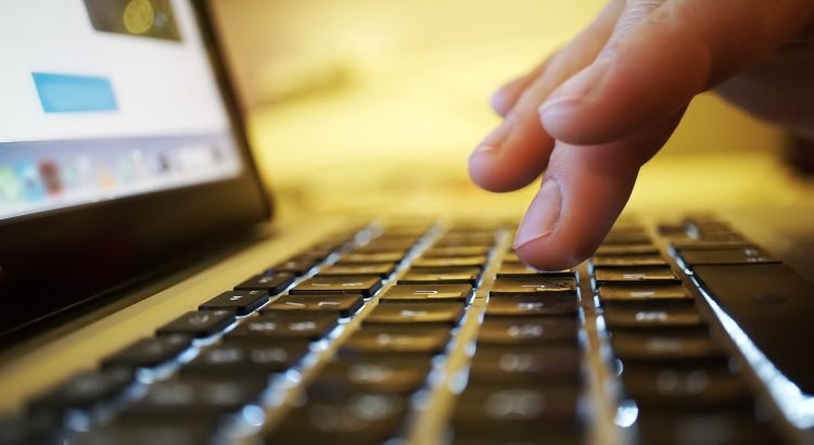 hands on the computer keyboard closeup